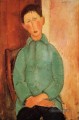 Junge in einem blauen Hemd Amedeo Modigliani